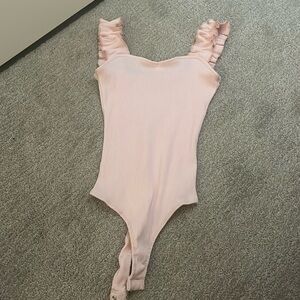 Pink Francesca’s bodysuit